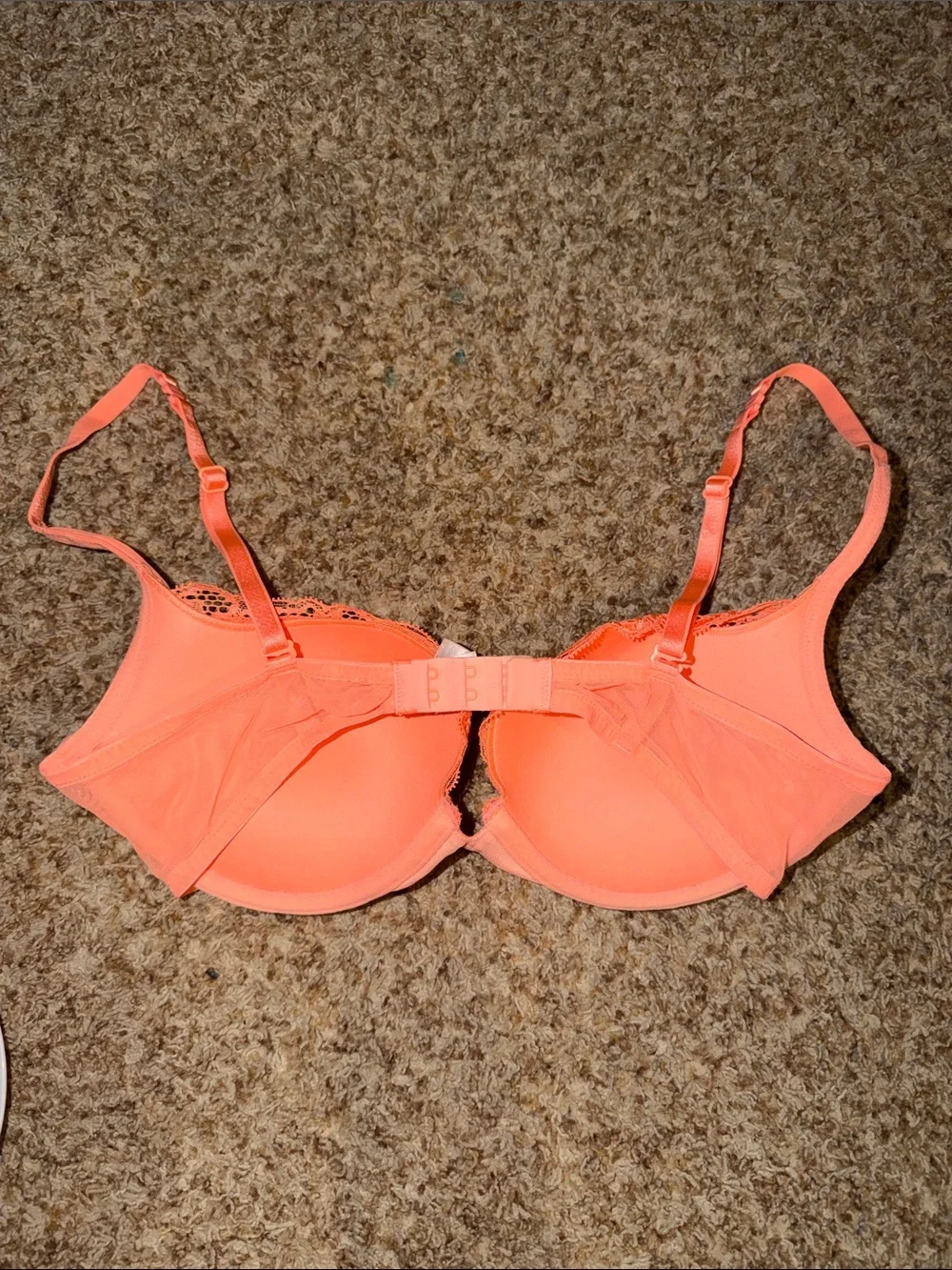 Bright orange Victoria’s Secret “Padded Demi” bra